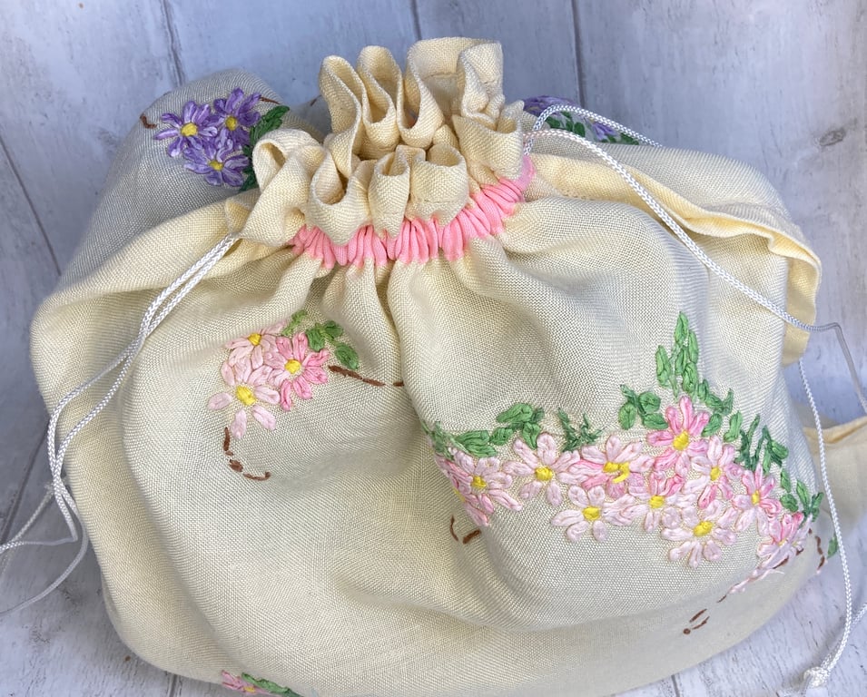 Travel packing laundry bag made from vintage embroidered cloth