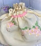 Travel packing laundry bag made from vintage embroidered cloth