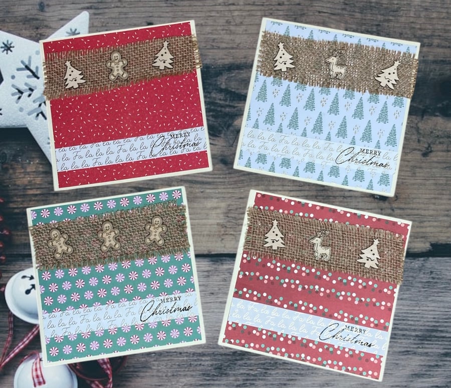 Set of four Christmas cards with wooden trees, gingerbread people and reindeer.