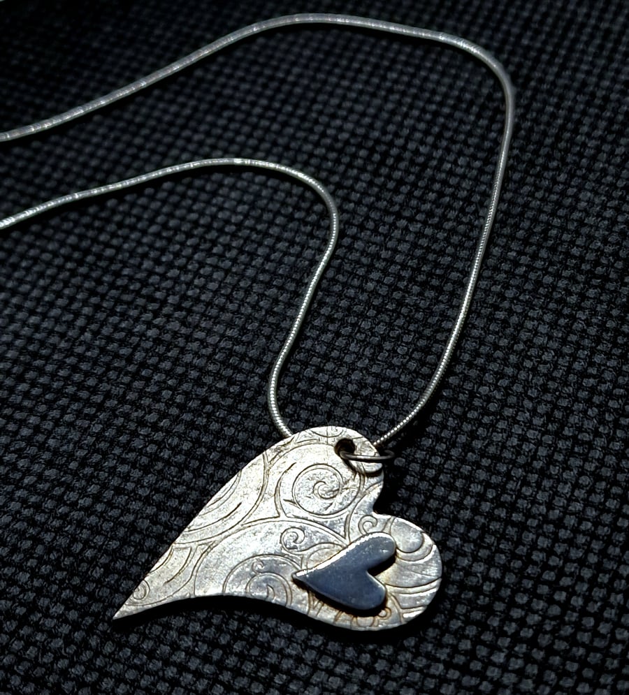 Two hearts combined pendant