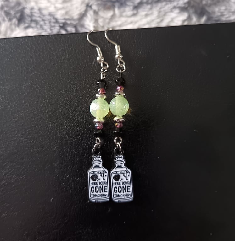 Black and white potion bottle charm dangle earrings with beads