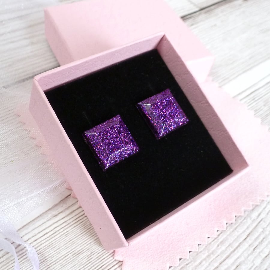 Square purple glitter studs. Sparkly bright purple earrings