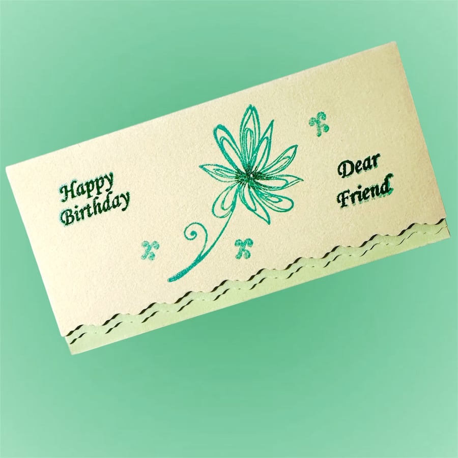 Happy birthday dear friend card with a pastel green flower and matching insert. 