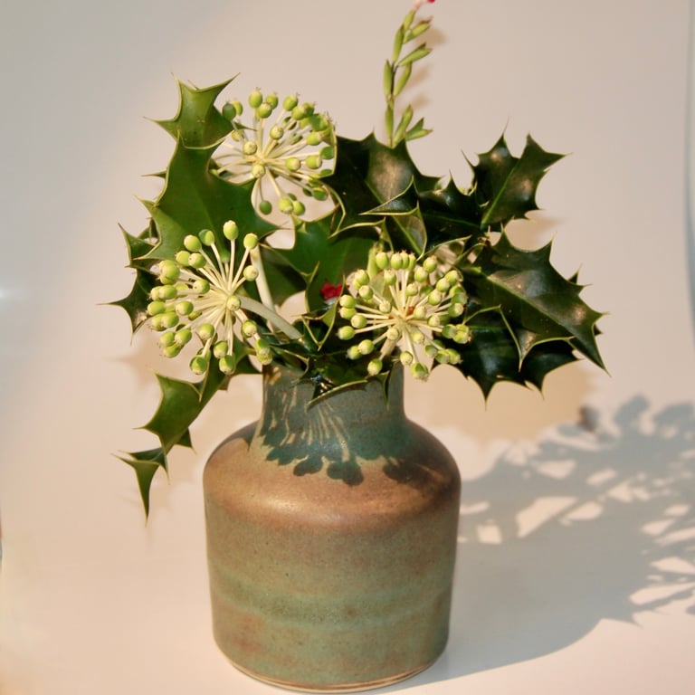 Olive green vase with antiqued glaze