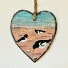 Oystercatchers on a slate