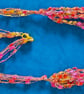Crocheted necklace in shades of red and gold, lightweight - Image 6