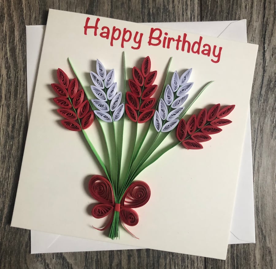 Stunning handmade quilled red flowers card