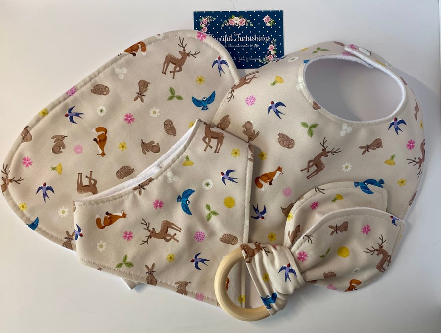 Four piece baby set - two bibs, shaped burp cloth & bunny eared teether 