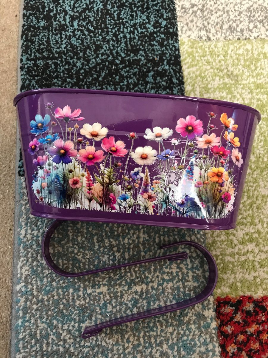 Purple fence planter with floral motif so pretty 