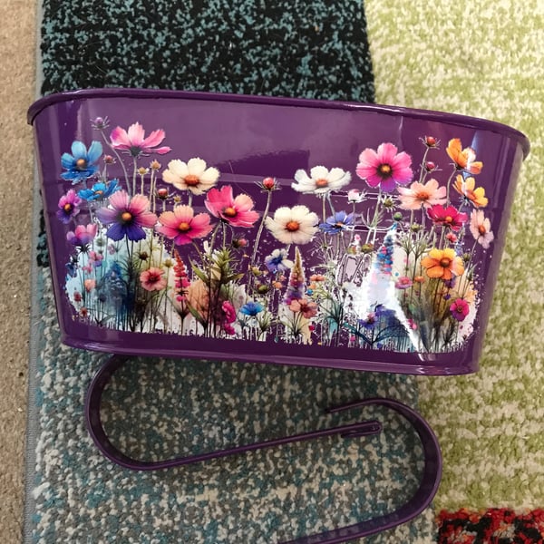 Purple fence planter with floral motif so pretty 