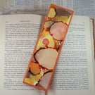 Orange alcohol inks laminated bookmark