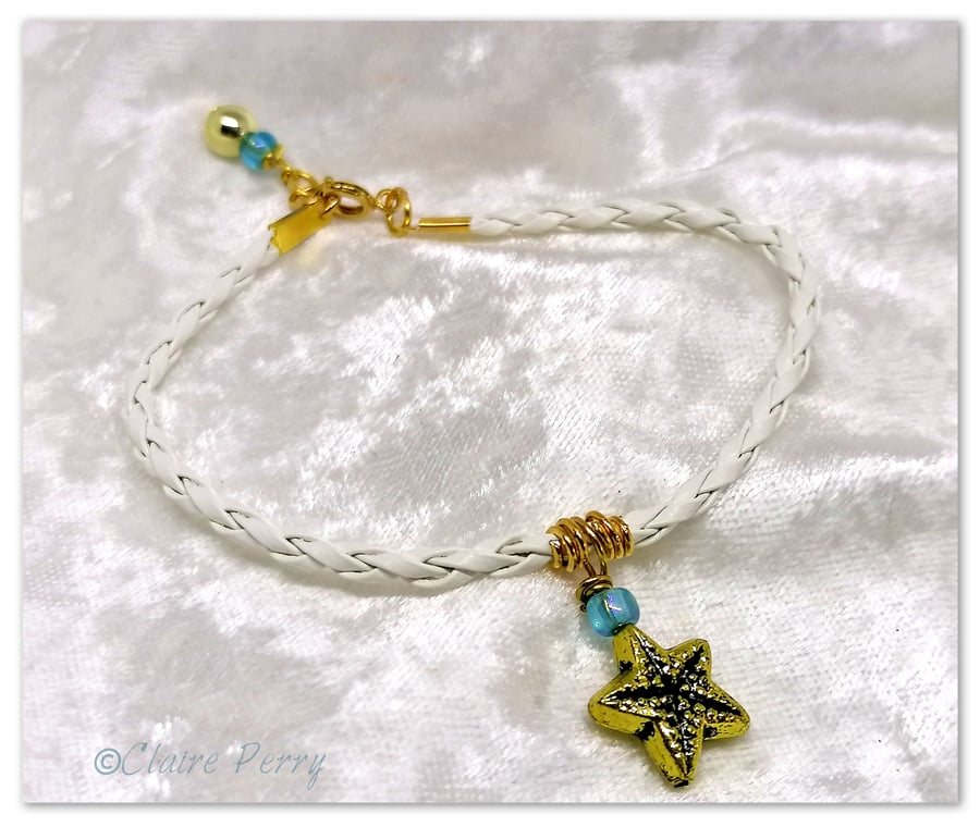 Bracelet White Faux Leather with gold plated Starfish charm bead.