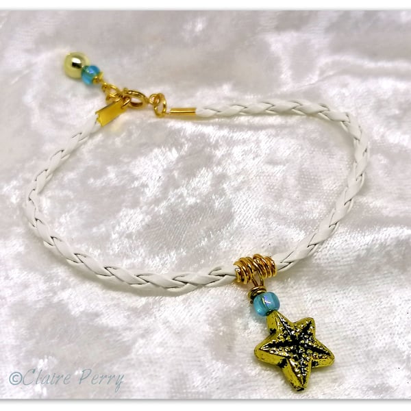 Bracelet White Faux Leather with gold plated Starfish charm bead.