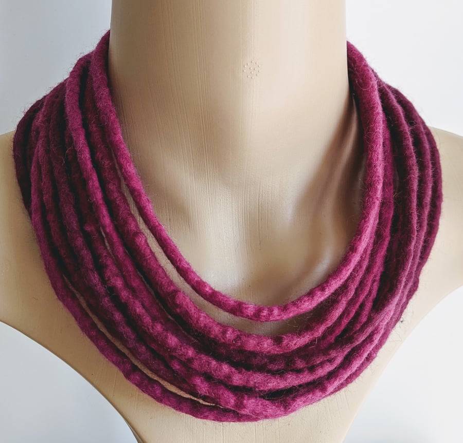 Felted cord necklace in shades of deep pink purple