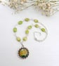 Green Pendant Necklace with Flower Art and Rosary-style Beadwork  - Image 3