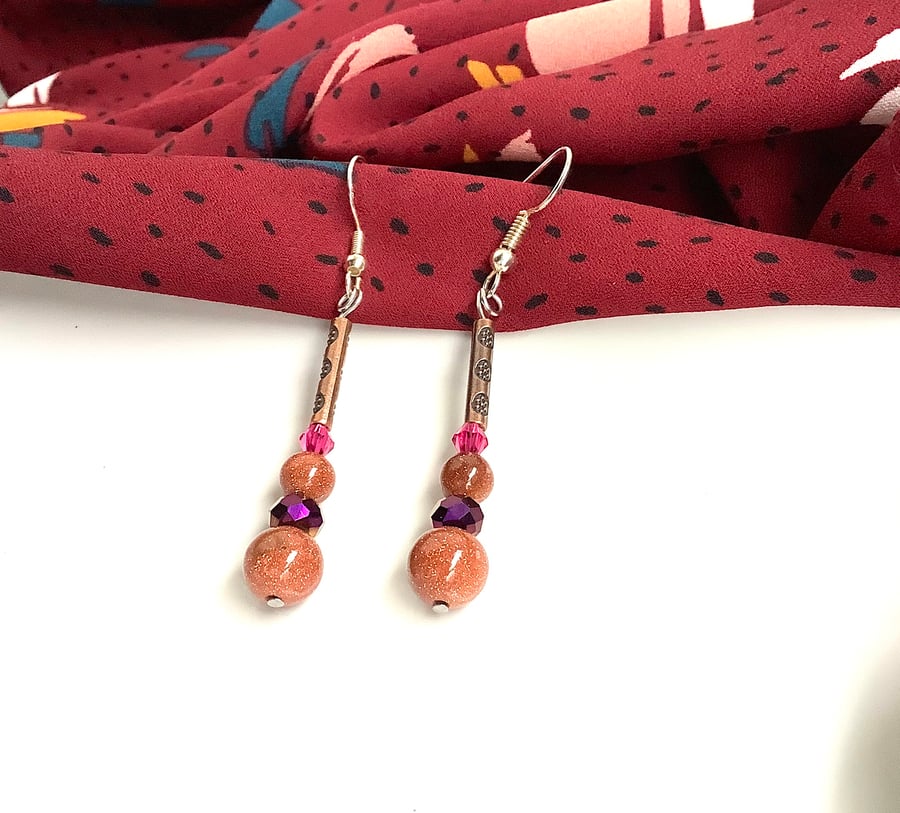 Sandstone Goldstone earrings, shiny dangling, silver plated fish hooks