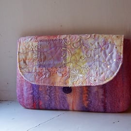 Textile art clutch bag in lilac and pink