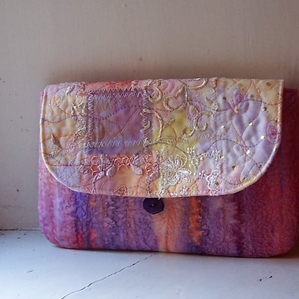 Textile art clutch bag in lilac and pink