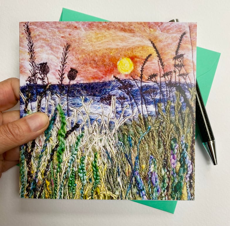 Sunrise on a misty morning across a hedgerow with the hills beyond printed card.