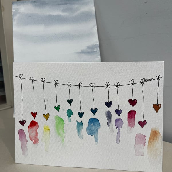 Rainbow hanging hearts watercolour hand painted card