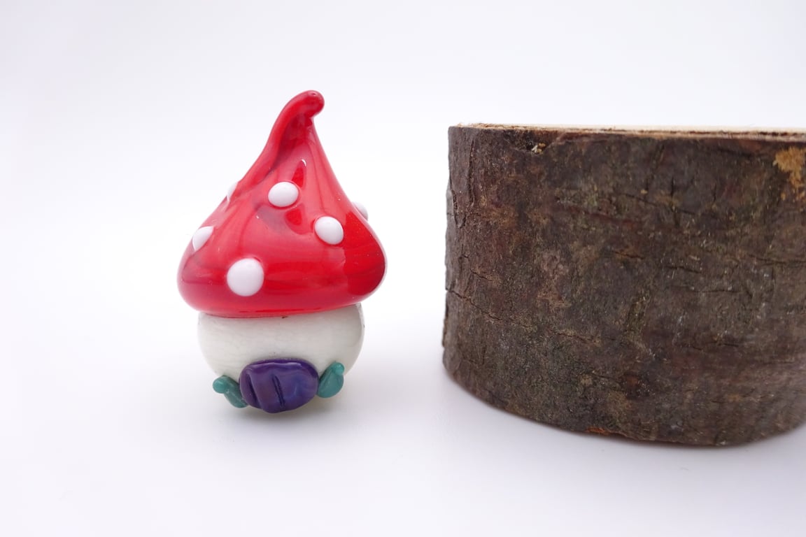 small glass toadstool house