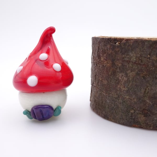 small glass toadstool house