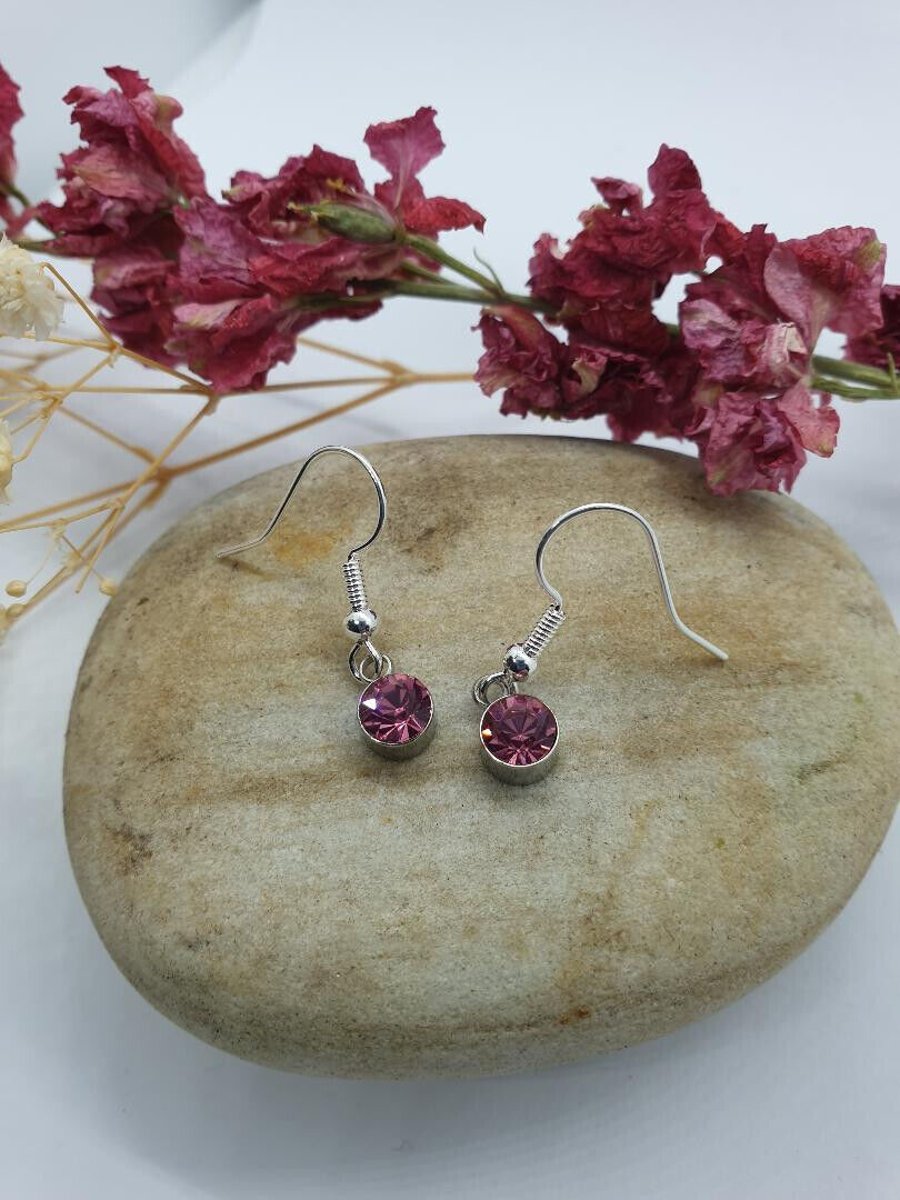 pink glass earrings sweet little silver plated earrings with pink glass pendants