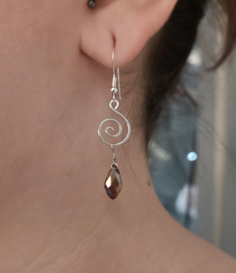Sterling silver wire wrapped spiral earrings with faceted glass teardrop beads