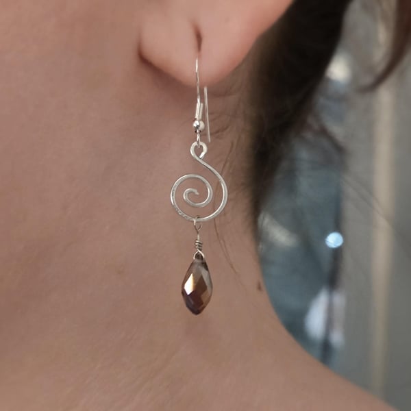 Sterling silver wire wrapped spiral earrings with faceted glass teardrop beads