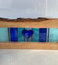 Blue Heart stained glass in solid ash frame with live edge feature