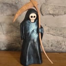 carved wooden Grim Reaper