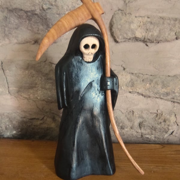 carved wooden Grim Reaper