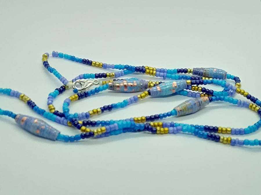 Long Summer Swirl Beaded Necklace in shades of blue with handmade paper beads