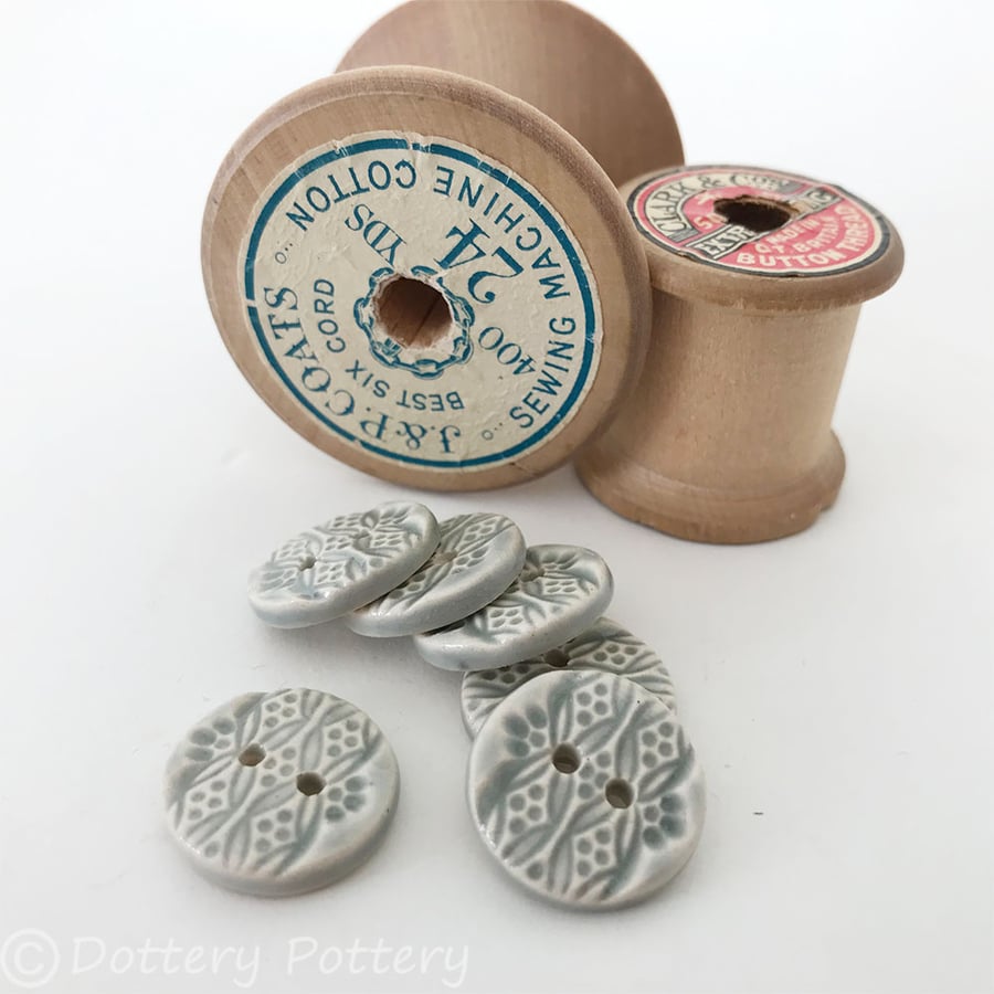 Set of six little round grey ceramic handmade buttons