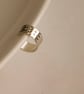 Slim silver ear cuff with a "dimpled" design - Image 4