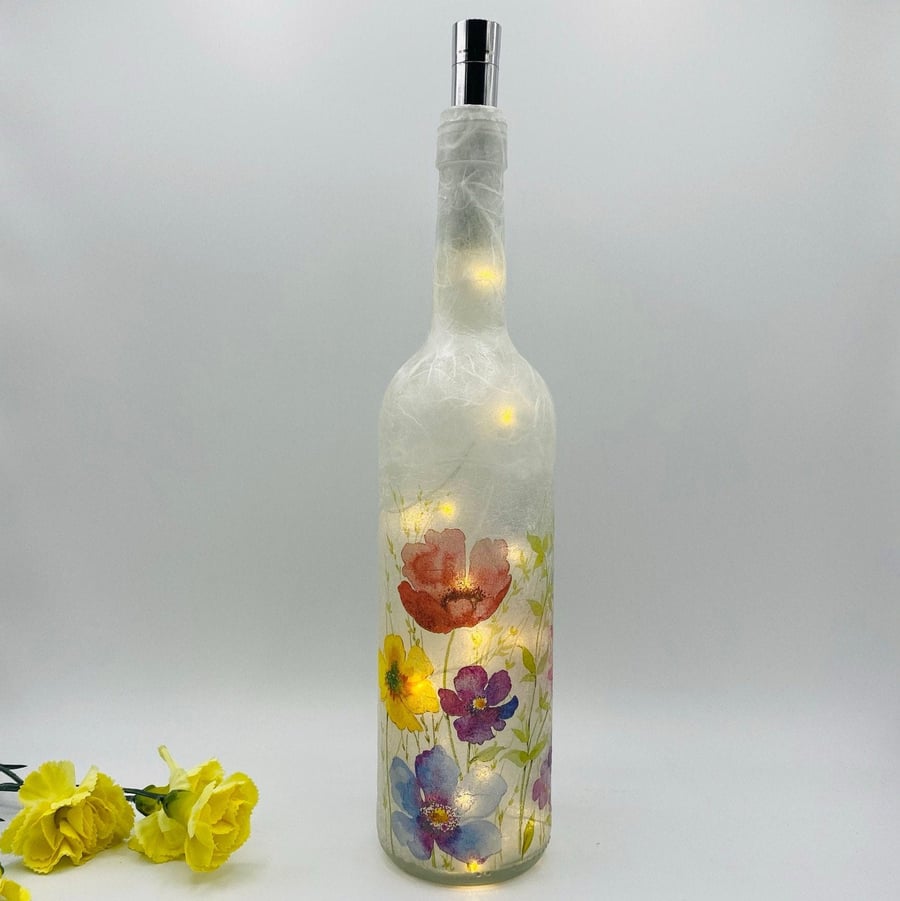 Decoupage bottle light with watercolour flowers
