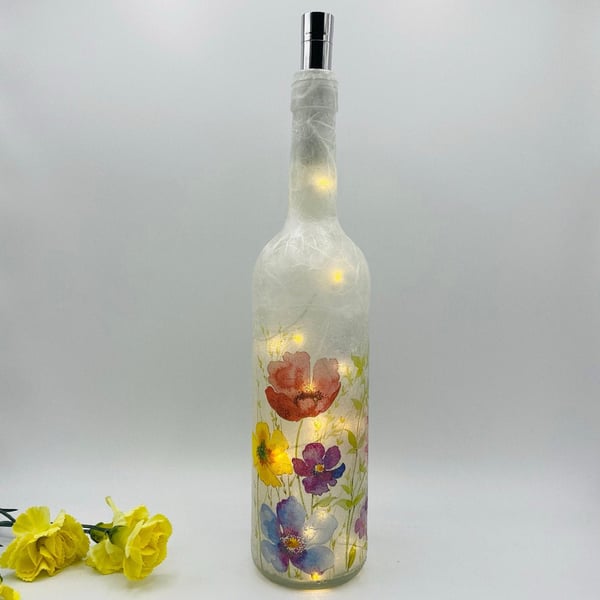 Decoupage bottle light with watercolour flowers
