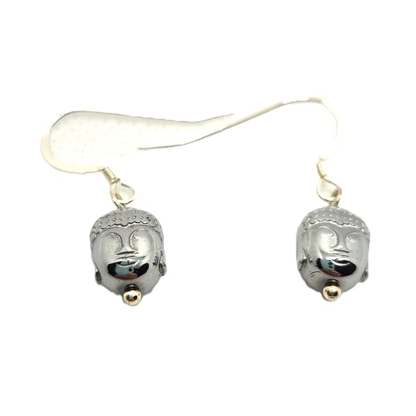 A pair of silver haematite buddha head charm earrings