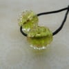 handmade lampwork glass beads, green glitter pair
