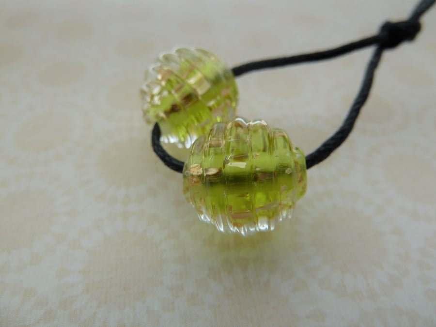handmade lampwork glass beads, green glitter pair