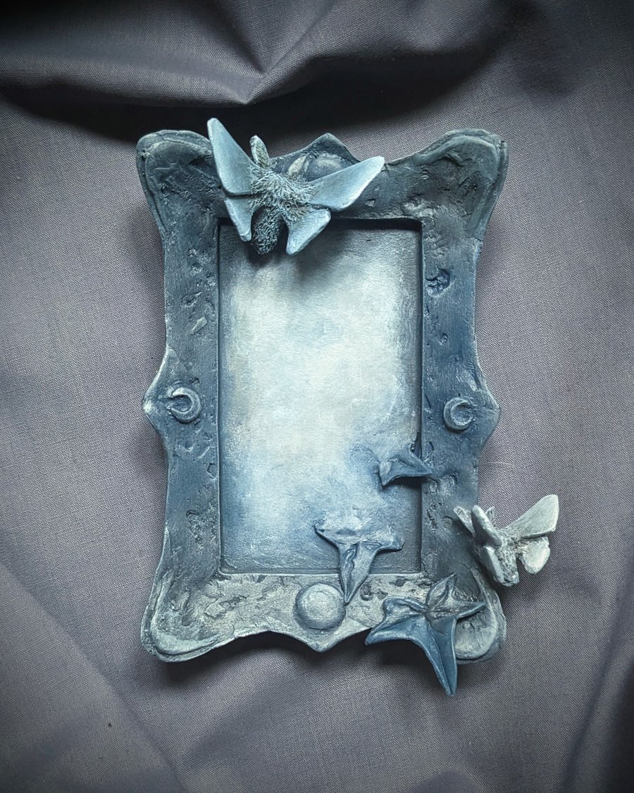Unseen vi - small, strange, beautiful moth and mirror sculpture
