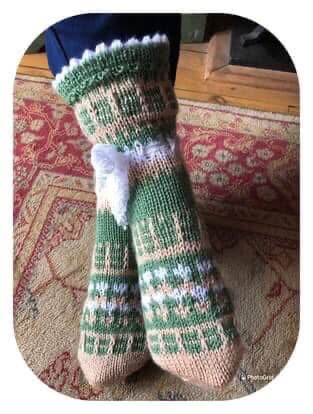 Green and beige hand knitted Fairisle slipper socks.