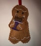 Chocolate Eating Gingerbread Decoration - Image 1
