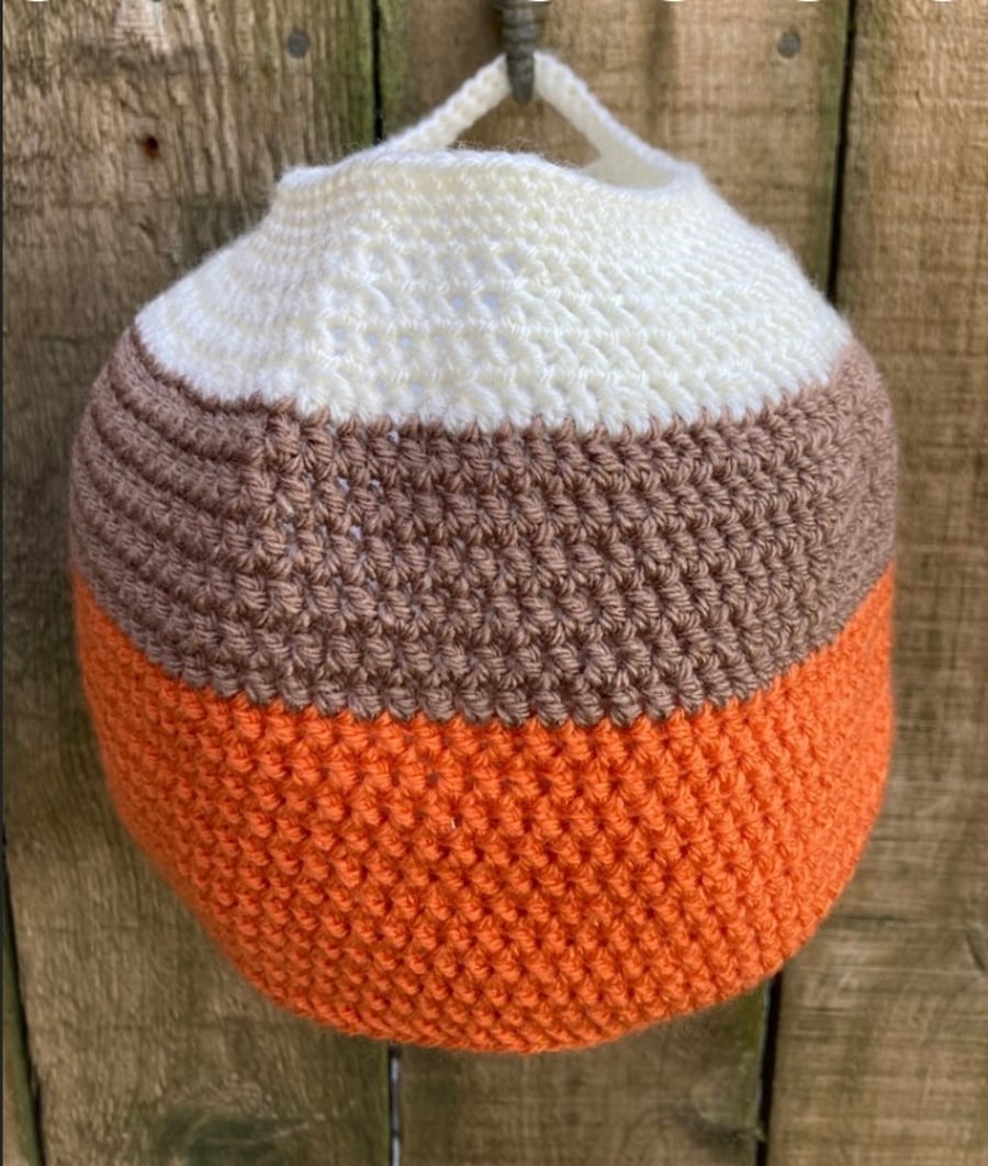 Crochet hanging basket in cream, brown and orange 
