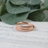 Copper overlap ring with line texture. Adjustable fit UK Q-R