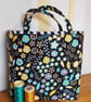 Turquoise on black gift bag  - Image 1