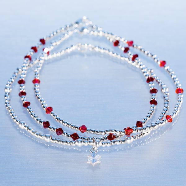 Bracelets Sterling silver with red swarovski and star charm 