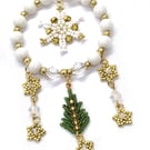 White gold and green Christmas tree and snowflakes hanging decoration