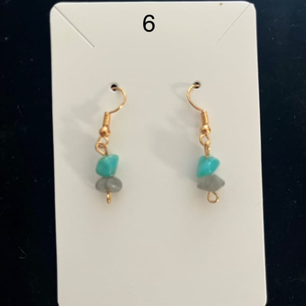Beautiful dangling earrings with green and grey stones 