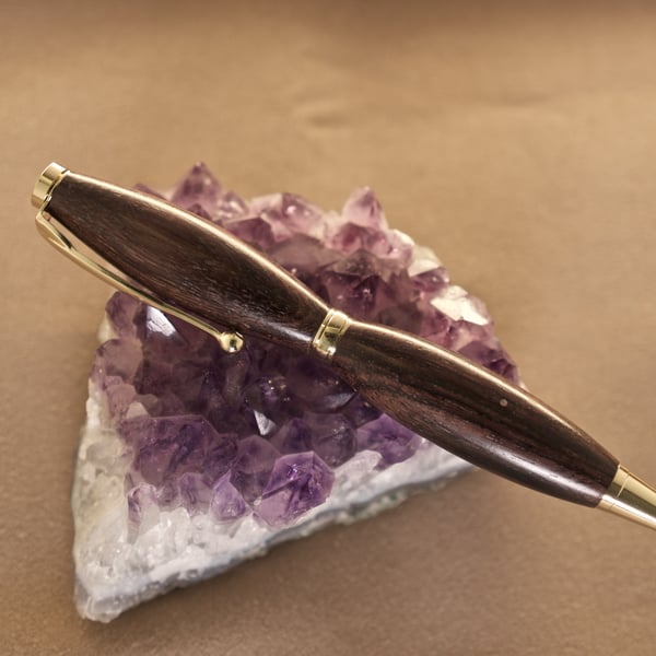Hand crafted dark wood ballpoint twist pen made on Orkney R6,3